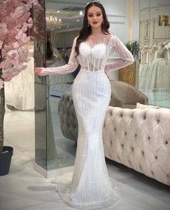 Luxury Mermaid Prom Dresses Long Sleeves V Neck Tassel Appliques Sequins Floor Length Celebrity 3D Lace Hollow Evening Dress Bridal Gowns Plus Size Custom Made