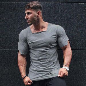 Herr t-skjortor märke kläder 2023 sommarskjorta män mode rippade hål fitness t-shirt kort ärm solid smal fit träning t-shirt