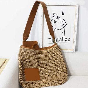 2022 Summer New High-capacity Straw Woven Bag One Shoulder Split Leather Holiday Portable Women's Bag Pastoral Woven Bag 230313