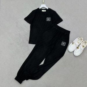 23SS Frauen Designer Trainingsanzüge Zweiteilige Hosen Sets mit Allover-Buchstaben Mädchen Runway Marke Jersey Jogging T-Shirts T-Shirt Crop Tops und Legging Pants Activewear Suit