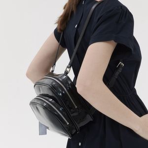 Sacos escolares Viajar para a bolsa de mochila de bolsas de bolsa Patente de couro para meninas Estudante ombro