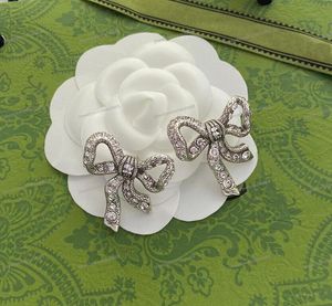 Designer di lusso in argento arco staring tacchino aretes orecchini di cristallo di alta qualità in ottone