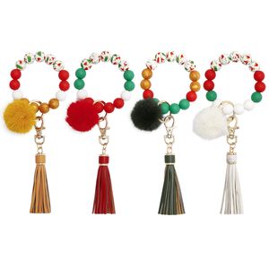 Portachiavi con braccialetto di perline di Natale Portachiavi con nappa intrecciata a mano Portachiavi con ciondolo a forma di palla di peluche