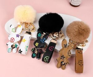 Designer keychain rabbit leather fur ball charm key chain car pendant metal fashion personality creative couple checkered variety of styles Pendants Charms