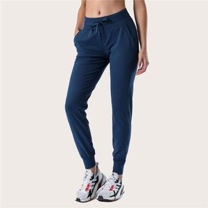 LU LU LIMÕES Calças femininas longas roupa de ioga solta nona calça Excerise esporte academia corrida casual calça com faixa no tornozelo elástico cintura alta com cordão Breatha