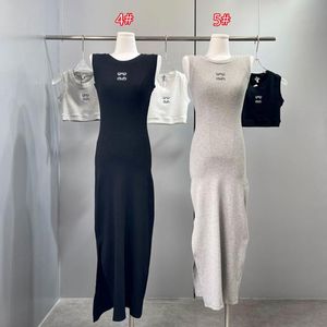 Kvinnor Casual Loewew Tankklänningar O Neck Sexig ärmlös ny lyxkläder Kvinnlig Bodycon Dress Party Beach Wear 573