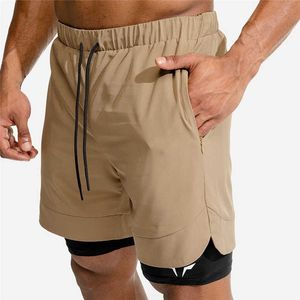 Shorts masculinos novos shorts masculinos mais vendidos 2 in1 shorts de bolso de segurança shorts masculinos de dois andares de secagem rápida shorts de corrida academia de ginástica G230315