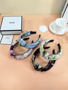 Lyx modedesigner blomma pannband hårband för kvinnor tjej märke elastisk pekband casual mode pannband huvud wrap gåva hög kvalitet