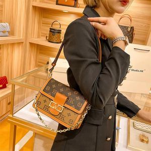 2023 Topp axelväskor Dauphine Fashion Chain Handväskor Crossbody Women Luxurys Designer Leather Hobo Totes Messenger Bag Wallet