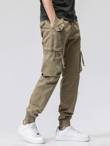 Calças masculinas primavera verão verão cargo de cargo de rua de streetwear multi-bockets Exército estilo militar algodão sólido calças táticas casuais