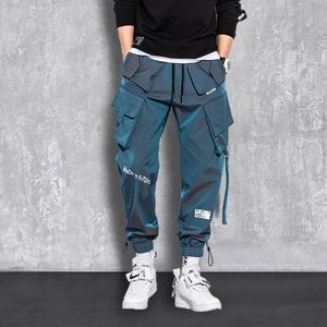 Men's Pants Fashion Streetwear Men Reflective Hip Hop Loose Cargo Pants Male Joggers Ribbon Men Harem Pants MaleTrousers 230316