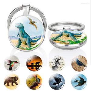 Nyckelringar 1 st våldsam grön dinosaurie dubbel sido -nyckelring djur påfågel svälja glas cabochon kupol smycken pendellangent kedjor