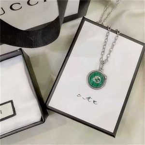 2023 Designer New Fashion jewelry Zhigujia 925 Silver Peacock Green double snake necklace, men's and women's sweater chain