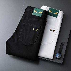 청바지 남성 2022 여름 얇은 스트레치 슬림 핏 작은 피트 한국 흑백 자수 캐주얼 바지 패션