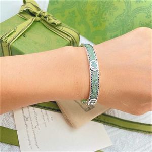 2023 Designer New jewelry silver carving used pattern drop glue light green enamel bracelet for men and women