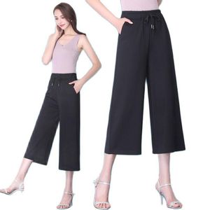 Calças femininas Capris Casual Mulheres calças primavera Moda de moda alta Canda alta Pressada de perna larga M-5xl plus sizew