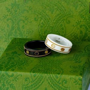 2023 Keramiskt band G Letter Rings Black White for Women Men smycken Guldring