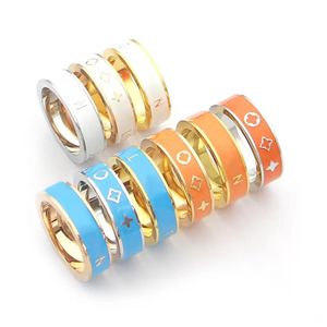 Classic Brand V Fashion White Orange Oil Dropping Four Leaf Flower Couple Wedding for Women 316L Titanium Steel Designer Ring Gift