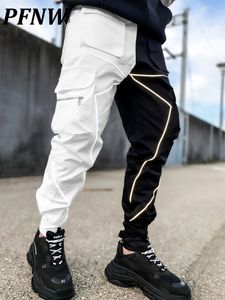 Мужские брюки PFNW Сплошные топы сшитые карманные грузы Dark High Street Streetwear Осень свободная тенденция Techwear Мужчина Темная одежда 12A1697 230320