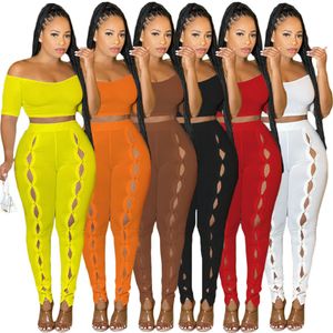 2023 Designer Summer Outfits Women Tracksuits Two Piece Sets Short Sleeve Slash Neck Top and Hollow Out Pants Sportswear Solid Bulk Wholesale Clothes 9505