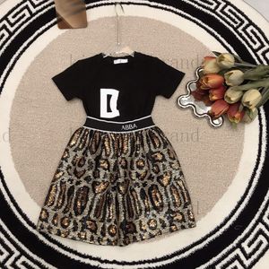 2023ss high end girls black skirts sets brand designer t shirts with pleated skirts two pieces sets summer girls embroidery tracksuits t-shirt fashion golden skirt