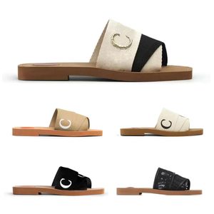 Designer strand tofflor mulor glider sandaler för kvinnor chic sross band woody canvas gummi lyxiga damer sommar mode casual platt toffel skor