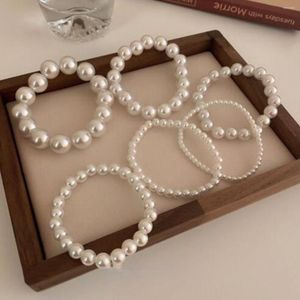 Filo 4 6 8 10 12 14mm Bracciale di perle di conchiglia di vetro bianco rotondo per ragazze in rilievo con design per la creazione di gioielli a mano elastica per donne avanzate