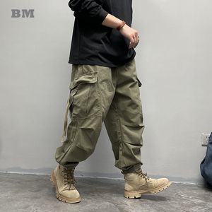 Męskie spodnie American Streetwear Big Pockets swobodne workowate spodnie ładunkowe Mężczyźni Ubranie japońskie hajuku taktyczne harem spustowe joggers 230320