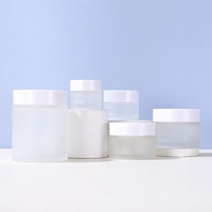 100pcs Frost Clear Glass Cream Jar Bottle 5g 10g 20g 30g 1oz Contenitore vuoto 30g 50g 100g Vasi cosmetici con coperchio bianco all'ingrosso