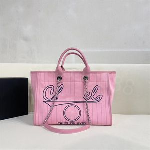 2023 ny sommar strandväska kvinnor Tote Classic Beach Bags Canvas Deauville Chain Bag Toppkvalitet Stor kapacitet Pochette Dam Shopping Bag Lyx Designer Handväskor