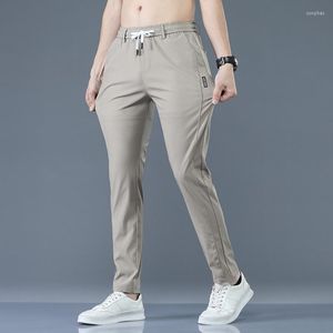 Calça masculina 2023 calças longas masculinas primavera verão verão seco rápido cor de cor sólida de cor de bolso de bolso de bolso