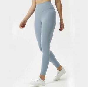 Leggings femininos feminino de tracksuit morelo gorjeta de gola de ioga de ioga nua esportiva sem costura de cintura pêssego quadris apertados de nove pontos de fitness correndo garotas