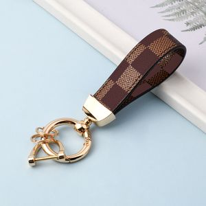 Presente criativo de couro de couro key anel de anel presbitópico de homens e mulheres de bolsas pendentes Internet Hot Fashion Metal Chain Chain