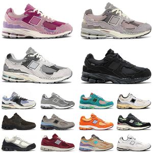 Klassisk 2002R Designer Casual Shoes for Men Women Fashion On Cloud Protection Pack Phantom Pink Lunar New Year Purple 2002 Sports Sneakers Trainers Outdoor