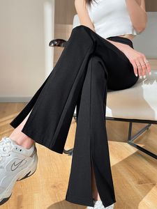 Kvinnors byxor capris plus size slits svarta flare byxor för kvinnor byxor koreansk stil casual office lady kvinnlig hög midja långa klockbotten byxor 230321