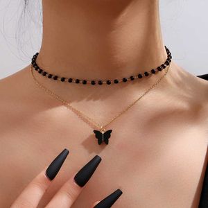 Naszyjniki wisiorek czarny motyl Naszyjnik koralika łańcuch opalowy błyszczące kobiety 2022 Trendowa temperament biżuterii Choker Naszyjnik ślubny Z0321