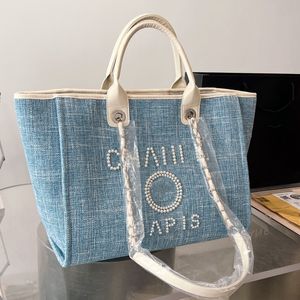 Bolsas de grife feminino bolsa de bolsa de bolsa de canal com pérolas grandes sacolas de lojas de lona com carteira de couro de couro na cadeia Livro de laptop bolsa luxurys bolsa de praia