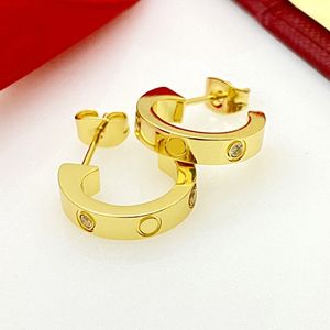 Brincos de chave de fenda de designer de luxo para mulheres de aço inoxidável casal de diamantes de ouro joias de amor presentes para mulheres acessórios por atacado