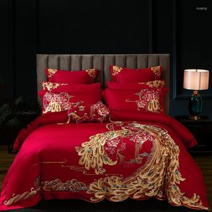 Sängkläder sätter lyxguld Phoenix broderi rött kinesiskt bröllop 100 -tal egyptisk bomullsuppsättning täcke täcke lakan sängöverdragskudde