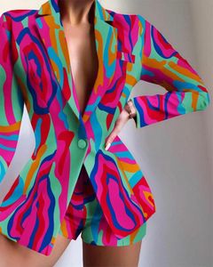 Женские комбинезоны снимают элегантные два часа, насыщенные промежутки эластичные шорты модные печатные пиджаки.