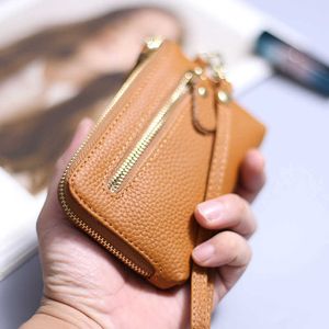 Pulseira de carteiras para mulheres bolsas de couro genuíno bolsas de embreagem 2022 New Ladies Money Credit Keychain Titular Short Wallet Y2303