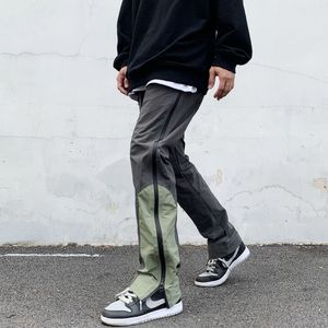 Män s byxor sida blixtlås svettbyxor mens high street hip hop funktionella övergripande lapptäcke last manliga avslappnade byxor koreanska streetwear 230322