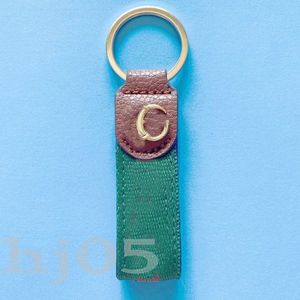 Unisex wallet keychain gold plated letter key ring fashion accessories bag charms red and green webbing luxury brown leather keyring small cute PJ055 C23