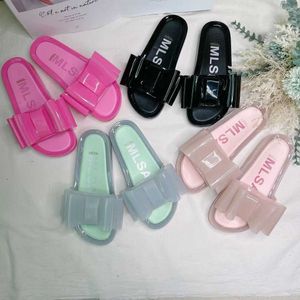 Kapcie gorące nowe Melissa Kobiety Kappy Bow Slajdy Letnie buty plażowe Kobiety Kapcia Płaskie obcasy Flip Flip Flops Ladies Melissa Sandals SM032 G230322