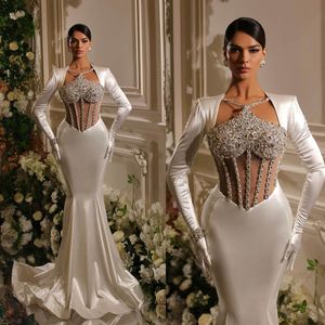 Seksowne syreny satynowe sukienki ślubne kryształy suknia ślubna niestandardowe z koralikami długie rękawy patrz przez sukienki ślubne