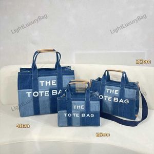 Neue hochwertige Designer M Denim Nähte Tote hohe Kapazität Crossbaby Umhängetaschen J Frauen Mode klassische Luxus Canvas Handtaschen 230323