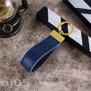 Strpie embossing mens keychain designer accessories keyring canvas leather with metal parts plated gold letters laides fashionable cute key buckle PJ068 B23