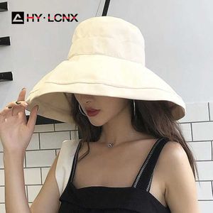 Chapéus largos de abrangência verão novo algodão respirável Big Brim Solid Color Fashion Bucket Hat Women Women Travel Outdoor Viagem Ajustável Sun Fisherman Hat P230311