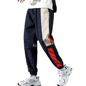 Pantaloni da uomo streetwear uomo nero pantaloni da jogging pantaloni 2023 mens grandi tasche nastri hiphop pantaloni cargo tuta maschile pantaloni sportivi uomo vestiti W0325