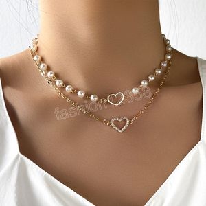 قلادات سلسلة طبقة مزدوجة للأزياء للنساء Crystal Heart Prendant Pearl Chain Scoker مجوهرات عصرية